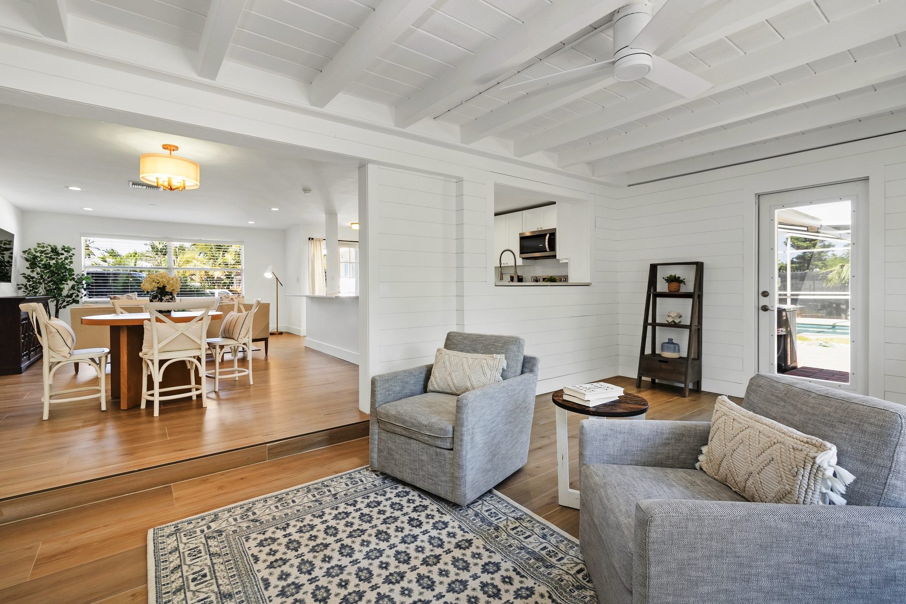 An open living and dining room after renovation